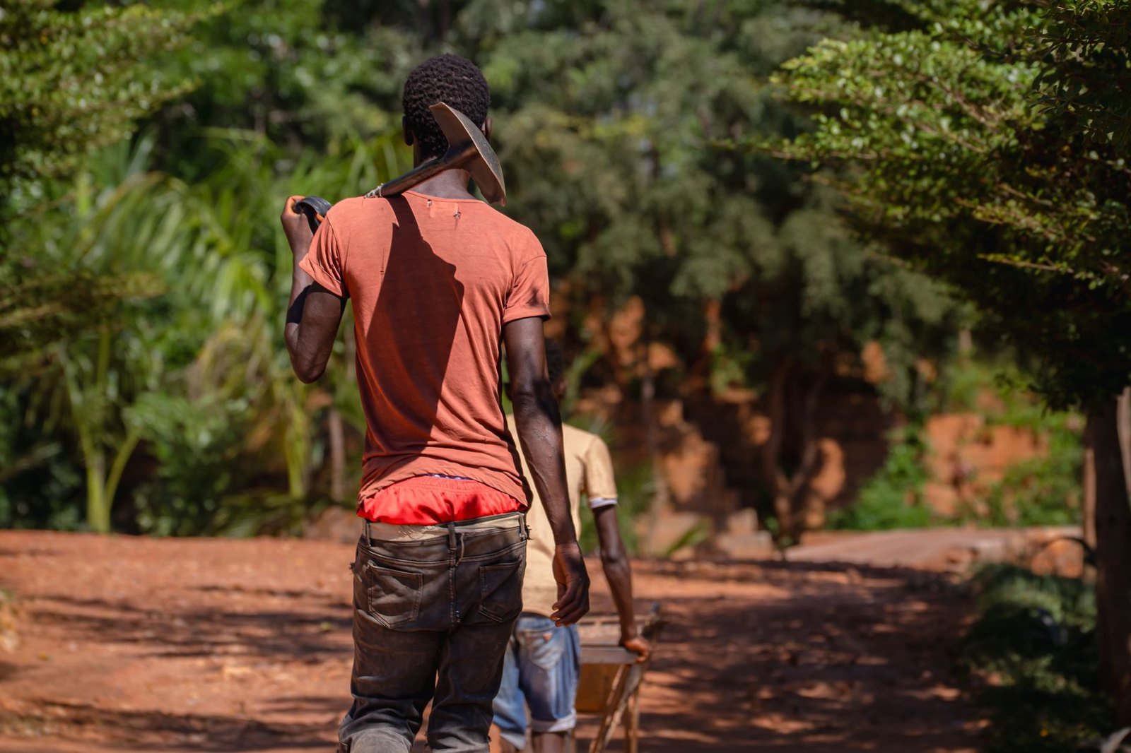 A man walking along a rural pathway, as Lighthouse Chapel ministers are sent to plant churches